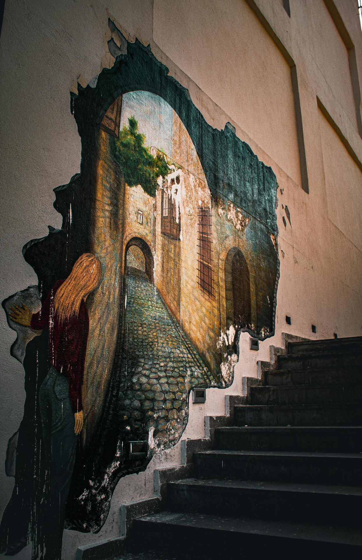 Large mural painted on a stairwell wall